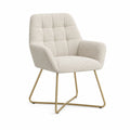 Silla de tejido bouclé beige con patas de metal